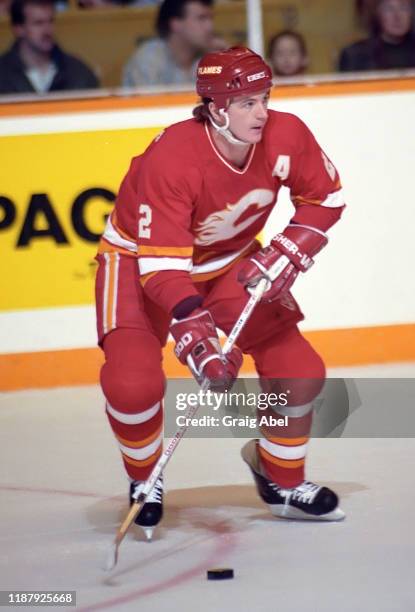 Al MacInnis of the Calgary Flames skates against the Toronto Maple Leafs during NHL game action on November 3, 1990 at Maple Leaf Gardens in Toronto,...