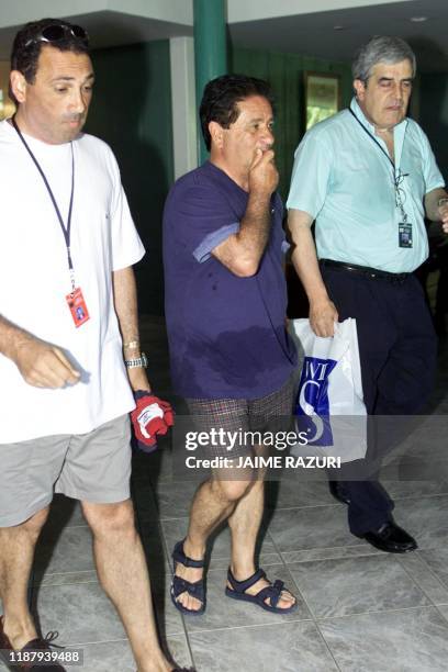 The president of Argentina Eduardo Duhalde along with members of his ministerial delegation are seen in their bathing suit a on 15 November 2002, in...