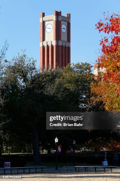 The University of Oklahoma clock tower stands over campus on November 9, 2019 near the Gaylord Family Oklahoma Memorial Stadium in Norman, Oklahoma.