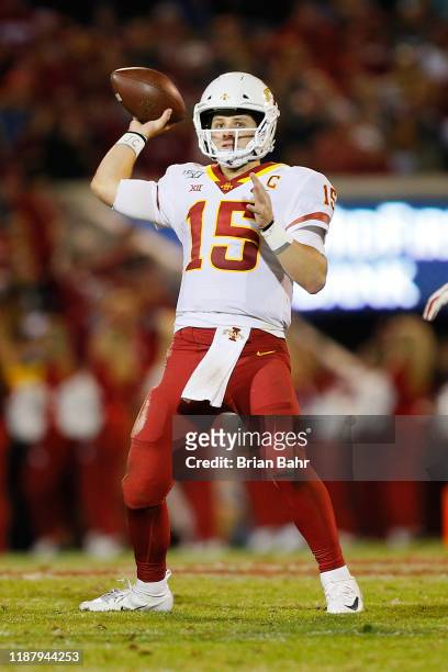 Quarterback Brock Purdy of the Iowa State Cyclones throws for a 12-yard gain against the Oklahoma Sooners in the fourth quarter on November 9, 2019...