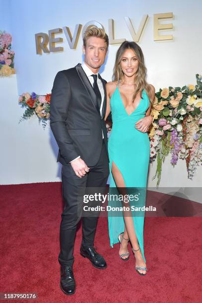 Caroline Einhoff and guest attend the #REVOLVEawards 2019 at Goya Studios on November 15, 2019 in Hollywood, California.