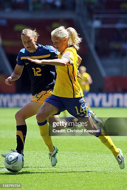 Emily van Egmond of Australia and Josefine Oqvist of Sweden fight for the ball during the FIFA Women's World Cup 2011 Quarter Final match between...
