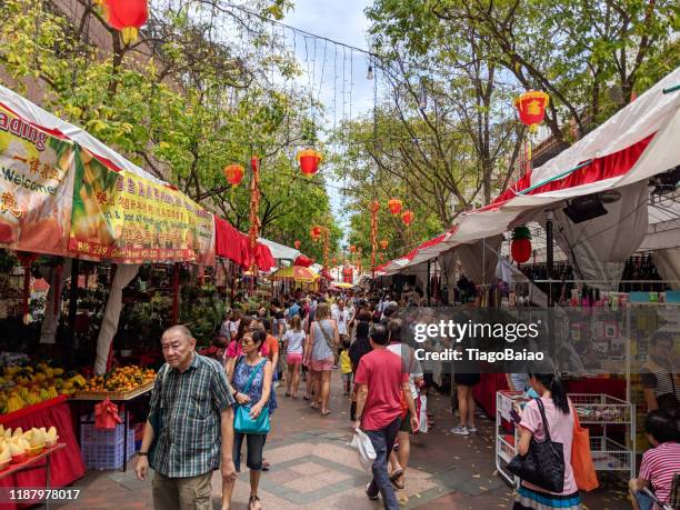 chinese street market in bugis singapore - singapore alley stock pictures, royalty-free photos & images