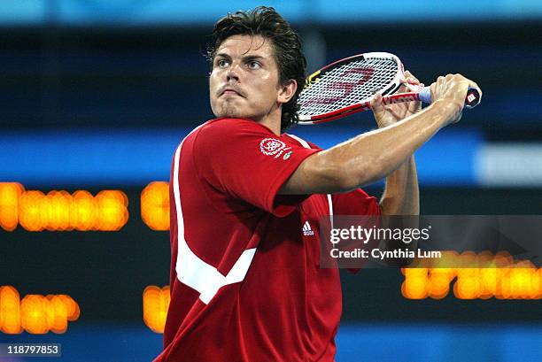 Taylor Dent of the United States in action against Tomas Berdych of the Czech Republic during the Athens 2004 Olympic Games Men's Tennis Single...