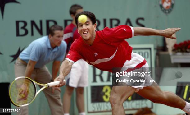 Guillermo Canas lunges for the ball. Guillermo Canas defeated Paul-Henri Mathieu 6-3, 7-6, 2-6, 6-7, 8-6 in the third round of the 2005 French Open...