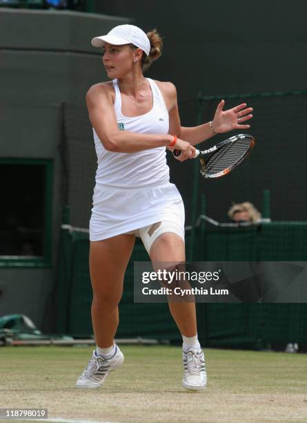 Severine Bremond of France during her 4-6, 4-6 loss to Belgium's Justine Henin-Hardenne in the quarterfinal of the Wimbledon Championships at the All...