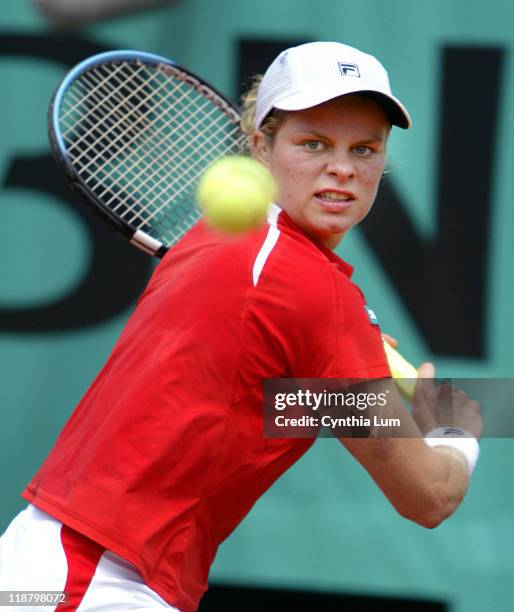 Kim Clijsters beats Conchita Martinez 6-1, 6-2 at the French Open Tennis Championships at the Roland Garros Stadium