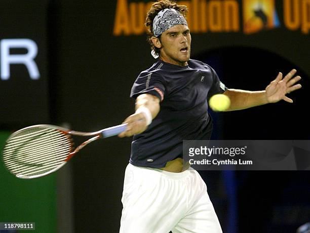 Mark Philippoussis hits a forehand during his first match against Sebastian Grosjean in the Ausralian Open at Melbourne Park on January 17, 2006....