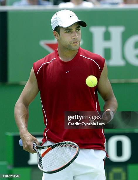 James Blake ready to serve to start 4th set against Nicolas Lapentti at the Australian Open, Melbourne, January 21, 2004