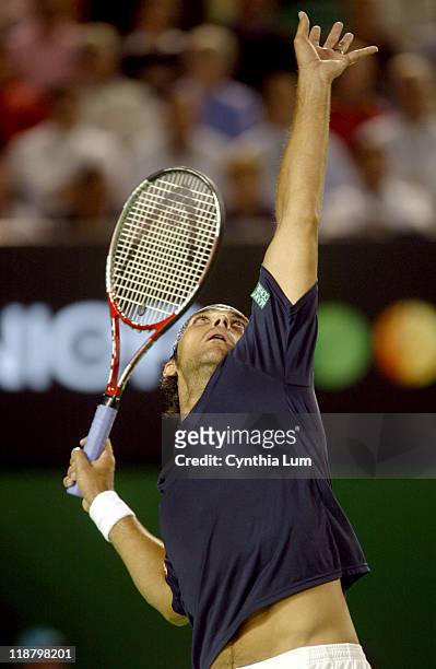 Mark Philippoussis serves during his first match against Sebastian Grosjean in the Ausralian Open at Melbourne Park on January 17, 2006. Match Ongoing