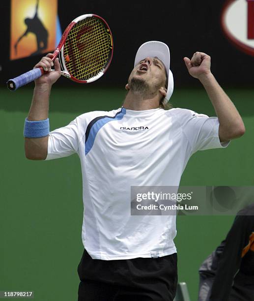 Tenth seed Gaston Gaudio defeats American Mardy Fish in a fourth-set tiebreaker in the first round of the 2005 Australian Open in Melbourne,...