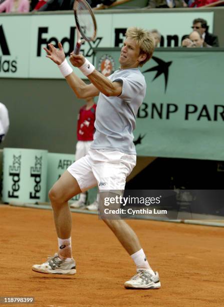 Jarkko Nieminen of Finland during his first round match against Andre Agassi of the United States at the 2005 French Open at Roland Garros Stadium in...