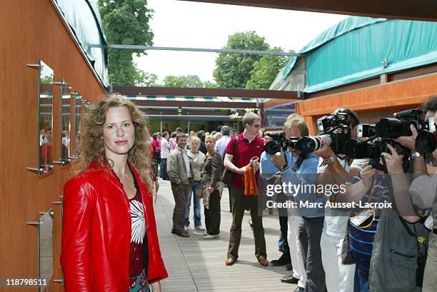 French actress Florence Darel poses at the 'Village' during the 8th day of French Open Tennis tournament held at Roland Garros stadium in Paris,...