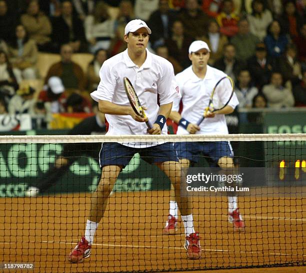 Mike Bryan and Bob Bryan of the United States during their Davis Cup final doubles match against Juan Carlos Ferrero and Tommy Robredo of Spain at La...