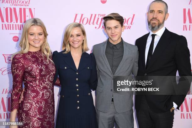 Actress Ava Phillippe, honoree Reese Witherspoon, Deacon Reese Phillippe, and talent agent at CAA Jim Toth attend the Hollywood Reporters annual...