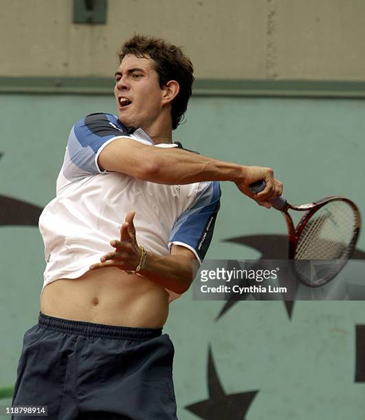 Guillermo Garcia-Lopez is defeated by Olivier Rochus at the 2005 French Open in Roland Garros Stadium on the May 24, 2005.