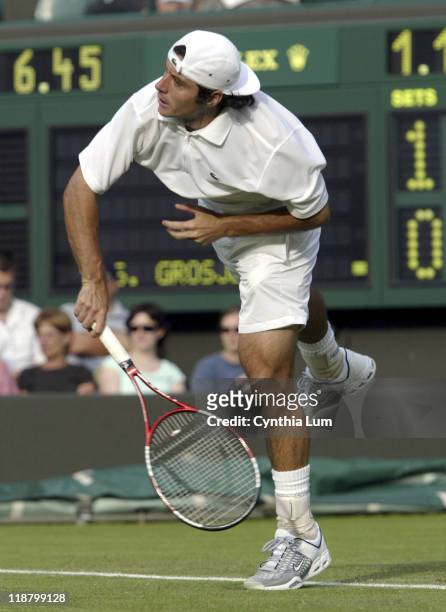 Sebastian Grosjean during his first round match against Michael Llodra at the 2005 Wimbledon Championships on June 21, 2005 which was suspended due...