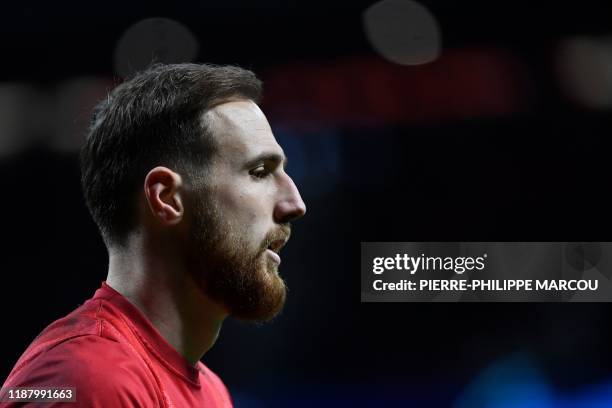 Atletico Madrid's Slovenian goalkeeper Jan Oblak warms up before the UEFA Champions League football match between Club Atletico de Madrid and...