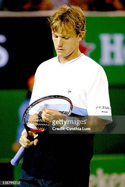 Thomas Johansson in action against Mark Philippoussis in their first round match at the 2004 Australian Open