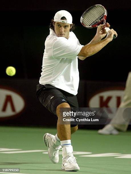 Sebastian Grosjean hits a forehand during his first match against Mark Philippoussis in the Ausralian Open at Melbourne Park on January 17, 2006....