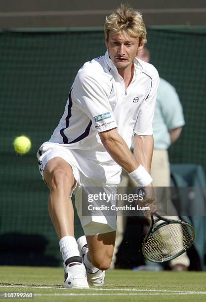 Sixth seed, Juan Carlos Ferrero upset by 27th seed Robby Ginepri, 6-3, 6-4,6-1