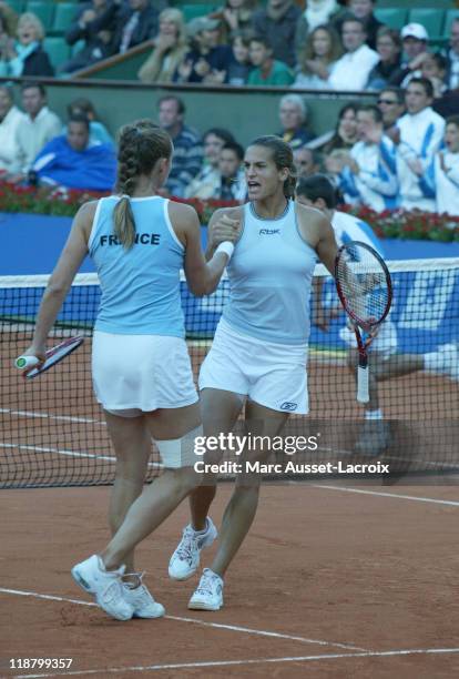 Federation Cup Final France vs Russia, Amelie Mauresmo and Mary Pierce in action vs Elena Dementieva and Dinara Safina for the double, at Roland...