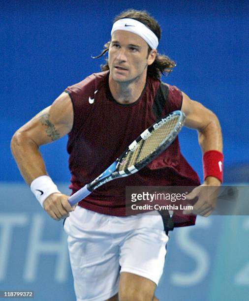 Carlos Moya in action against Ivo Karlovic in the third round of men's singles during the Athens 2004 Olympics Games at Goudi Olympic Hall in Athens,...