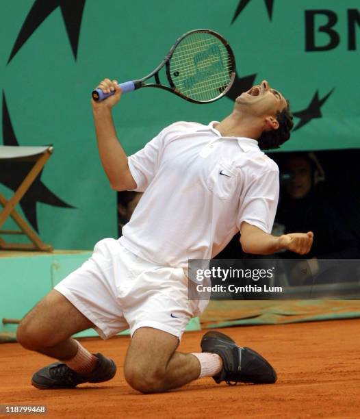 Albert Costa beats Juan Carlos Ferrero 6-1, 6-0, 4-6, 6-3 in the men's final of the 2002 French Open