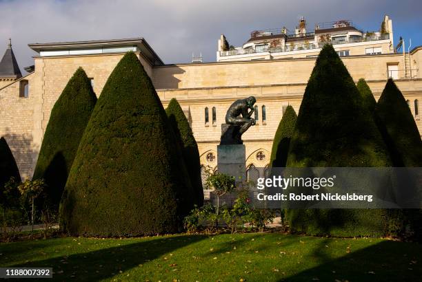 The Thinker, a bronze statue made in 1904 by sculpture Auguste Rodin , sits in a garden at the Musée Rodin in Paris, France on November 9, 2019. The...