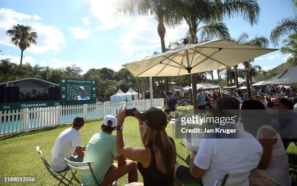 Fans enjoy the atmosphere in the village during the third round of the Nedbank Golf Challenge hosted by Gary Player at Gary Player CC on November 16,...