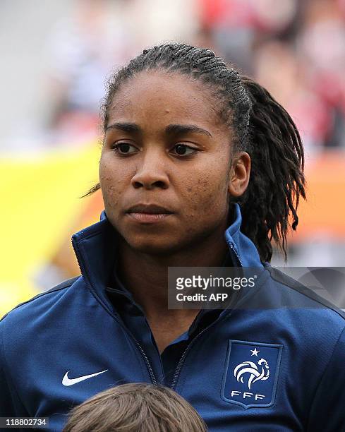 France's defender Laura Georges poses for a group photo prior to the quarter-final match of the FIFA women's football World Cup England vs France on...