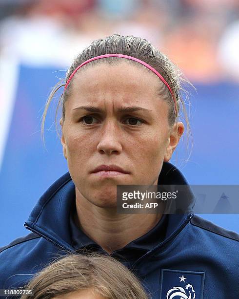 France's midfielder Camille Abily poses for a group photo prior to the quarter-final match of the FIFA women's football World Cup England vs France...