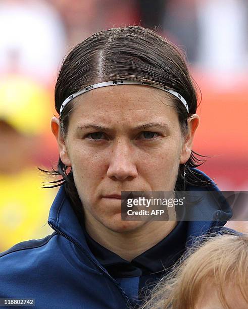 France's midfielder Elise Bussaglia poses for a group photo prior to the quarter-final match of the FIFA women's football World Cup England vs France...