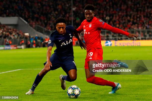 Bayern Munich's Canadian midfielder Alphonso Davies vies with Tottenham Hotspur's English defender Kyle Walker-Peters during the UEFA Champions...