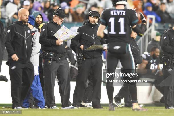 Philadelphia Eagles head coach Doug Pederson and Philadelphia Eagles offensive Coordinator Mike Groh confer during the game between the New York...