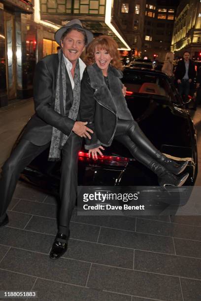 David Hasselhoff and Bonnie Langford pose with KITT from Knight Rider at the gala party to celebrate David Hasselhoff joining the cast of the West...