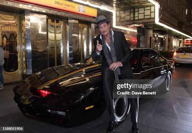 David Hasselhoff poses with KITT from Knight Rider at the gala party to celebrate David Hasselhoff joining the cast of the West End production of "9...