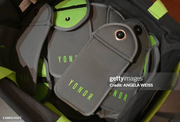 Yondr' pouches are seen at an exhibition at the Brooklyn Museum on November 22, 2019 in New York City. Yondr creates phone-free spaces for artists,...