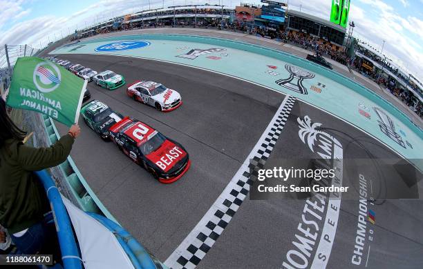 Tyler Reddick, driver of the Tame the Beast Chevrolet, takes the green flag to start the NASCAR Xfinity Series Ford EcoBoost 300 at Homestead-Miami...