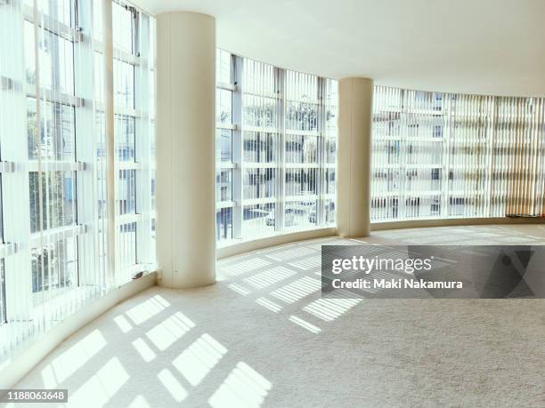 the white hall where the sunlight falls. - minimalist living in japan stock pictures, royalty-free photos & images