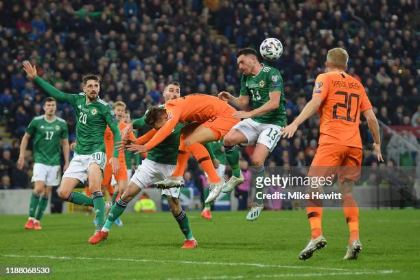Luuk de Jong of Netherlands collides with Corry Evans of Northern Ireland during the UEFA Euro 2020 Group C Qualifier match between Northern Ireland...