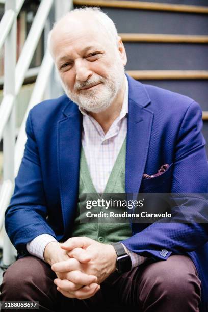 American writer Andre Aciman poses at the presentation of his new book "Cercami" on November 16, 2019 in Sesto San Giovanni, Italy.