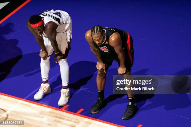 Kawhi Leonard of the LA Clippers and Pascal Siakam of the Toronto Raptors look on during the game on December 11, 2019 at the Scotiabank Arena in...
