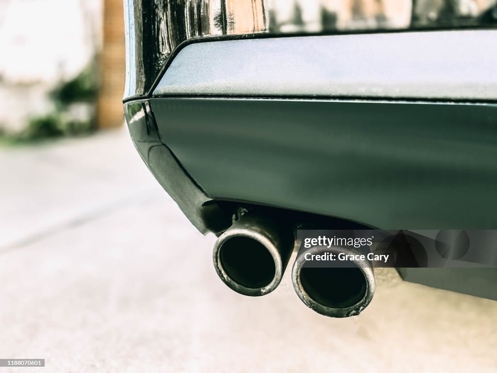 Close-Up of Dirty Exhaust Pipes