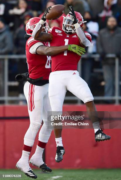 Austin Kutscher celebrates with Isaih Pacheco of the Rutgers Scarlet Knights after his touchdown in the first quarter of their game against the Ohio...