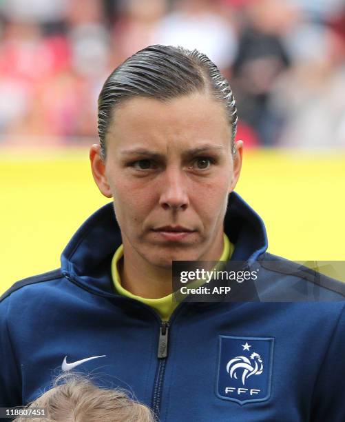 France's goalkeeper Celine Deville poses for a group photo prior to the quarter-final match of the FIFA women's football World Cup England vs France...