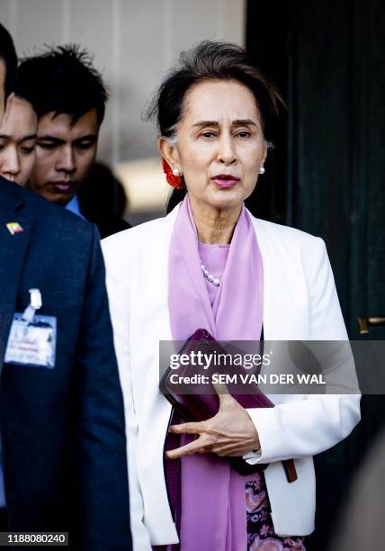 Myanmar's State Counsellor Aung San Suu Kyi leaves the Peace palace in The Hague, on December 12, 2019 on the the last day of a three-day hearing on...