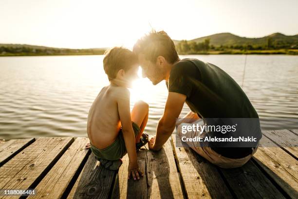 on a lake with my dad - jetty lake stock pictures, royalty-free photos & images