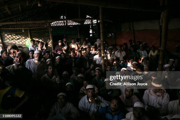 Rohingya refugees watch ICJ proceedings at a restaurant in a refugee camp on December 12, 2019 in Cox's Bazar, Bangladesh. The UN's International...