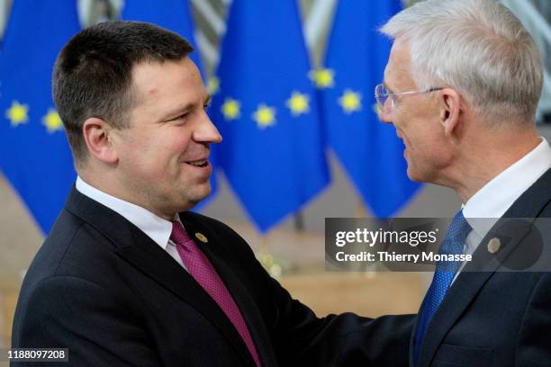 Estonian Prime Minister Juri Ratas is talking with the Latvian Prime Minister Krisjanis Karins on the first of a two-day summit of European Union...